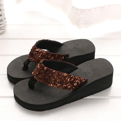 Women’s platform slides with brown sequin strap and thick black sole on Tampa Home & Garden Store