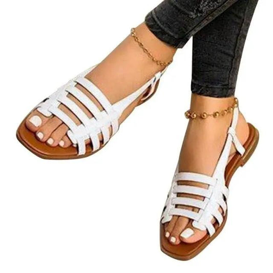 Stevvex white strappy sandals pair with open toe, ankle strap and brown sole on Tampa Home & Garden Store