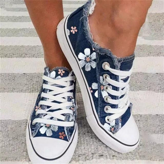 Stevvex floral denim sneakers with white laces and frayed edges, round toe, two sneakers on Tampa Home & Garden Store