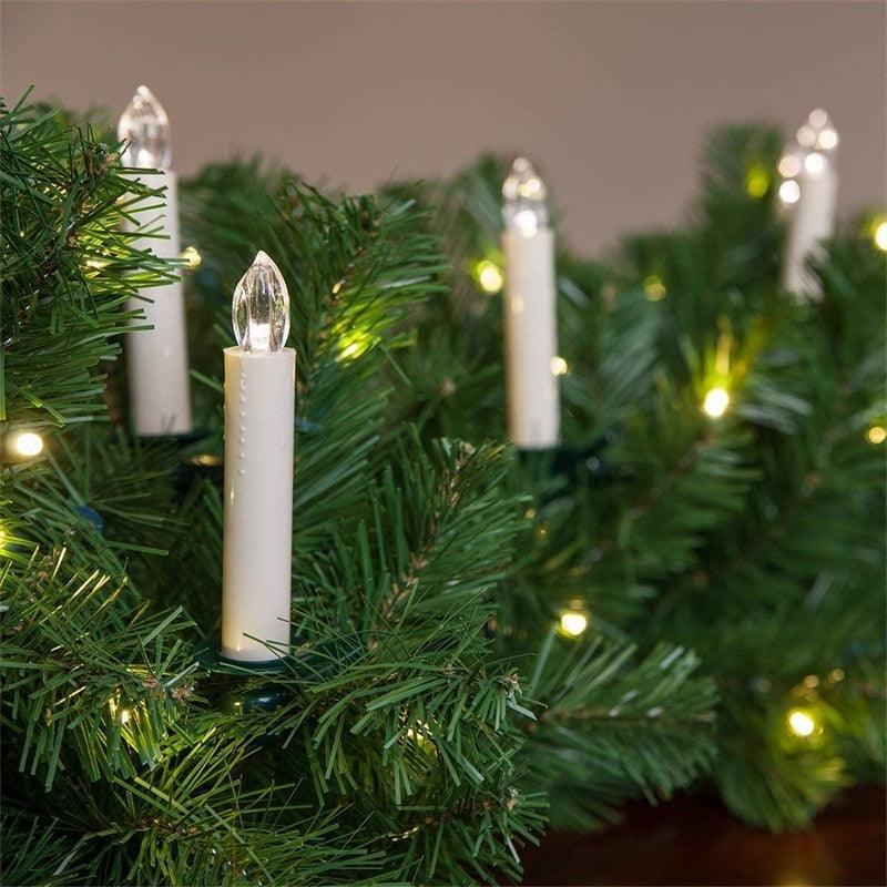 Stevvex flameless LED taper candles on Christmas tree with warm white light, remote control on Tampa Home & Garden Store