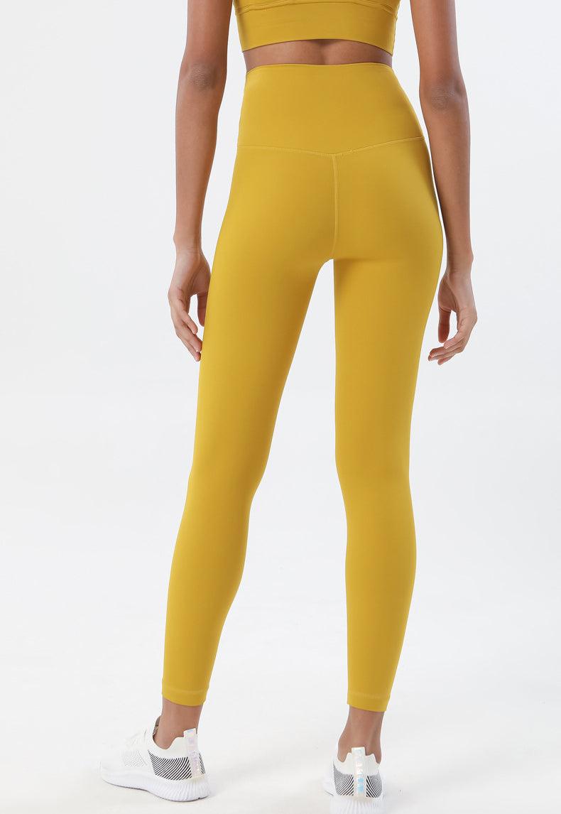 Stevvex high-waist yoga leggings with pockets in mustard yellow, full-length back view on Tampa Home & Garden Store