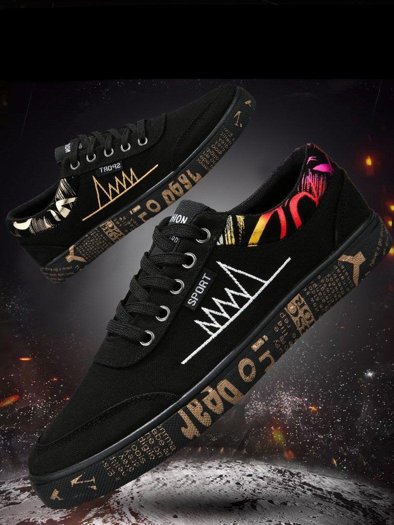 Stevvex men's black canvas sneakers pair with white zigzag logo and graphic sole details on Tampa Home & Garden Store