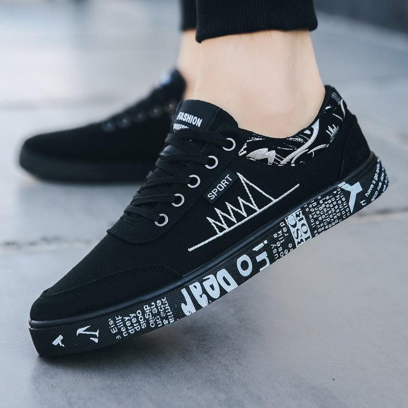 Stevvex men's black canvas sneakers with lace-up front and graphic white sole on Tampa Home & Garden Store