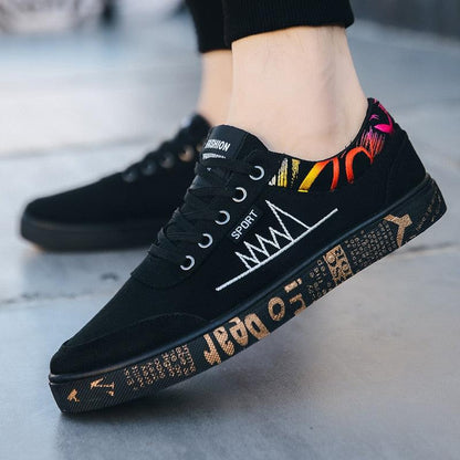 Stevvex black canvas sneakers, lace-up low-top with multicolor heel accent and graphic sole on Tampa Home & Garden Store