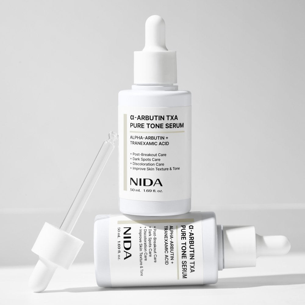 serum NIDA α-Arbutin TXA Pure Tone Serum 50ml, two white dropper bottles on Tampa Home & Garden Store