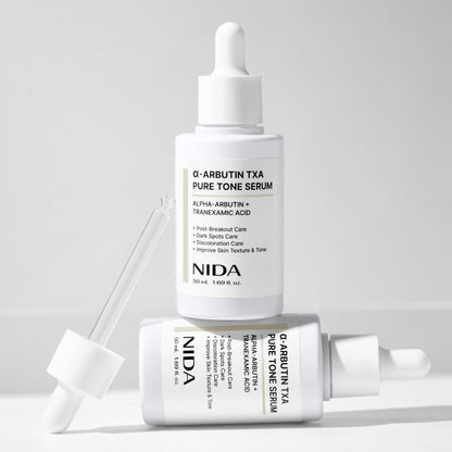 serum NIDA α-Arbutin TXA Pure Tone Serum 50ml, two white dropper bottles on Tampa Home & Garden Store