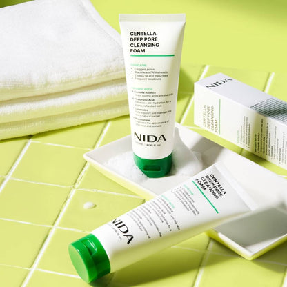 Two Seoulia NIDA Centella Deep Pore Cleansing Foam 120ml tubes with green caps on lime tile on Tampa Home & Garden Store