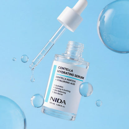 NIDA Centella Hydrating Serum bottle with dropper by Seoulia, 50ml serum on blue backdrop on Tampa Home & Garden Store