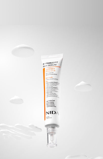 NIDA Invisible Fit Sun Serum sunscreen tube, white with orange accent SPF50+ PA+++, Seoulia on Tampa Home & Garden Store