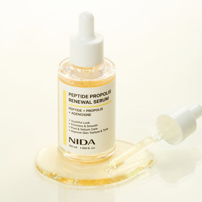 Serum bottle NIDA peptide propolis renewal serum with dropper and yellow liquid, white cap on Tampa Home & Garden Store