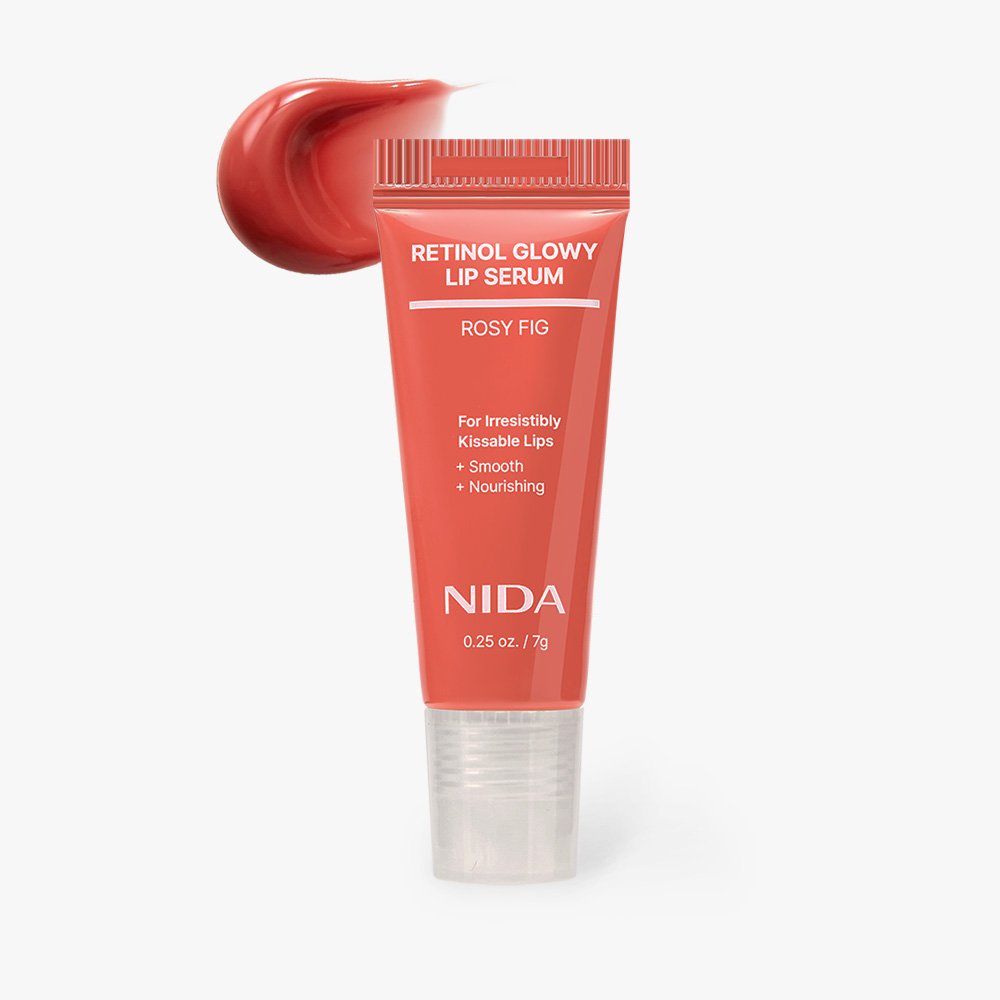Lip Serum NIDA Retinal Glowy Rosy Fig, coral tube with white text on Tampa Home & Garden Store