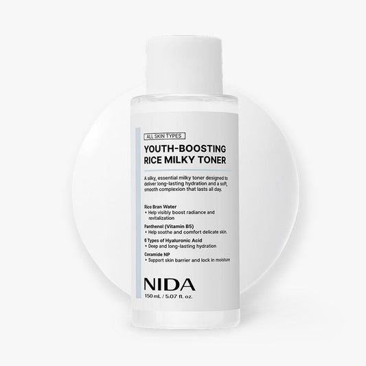 NIDA Youth-Boosting Rice Milky Toner bottle, white plastic with pale blue label, 150ml on Tampa Home & Garden Store