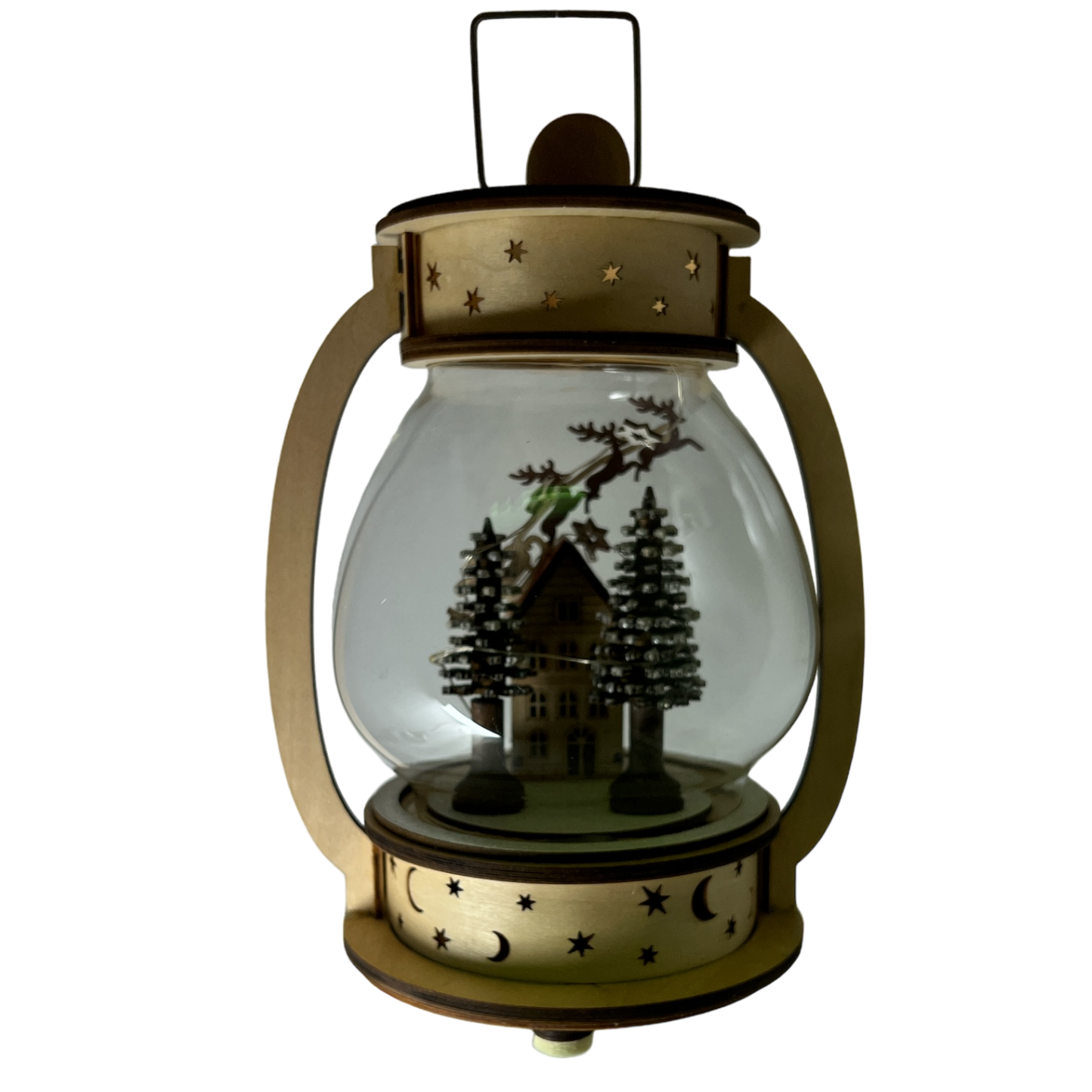 Lanterne musicale en bois et verre à remontoir lumineuse B/O - Le Père Noël survole la maison