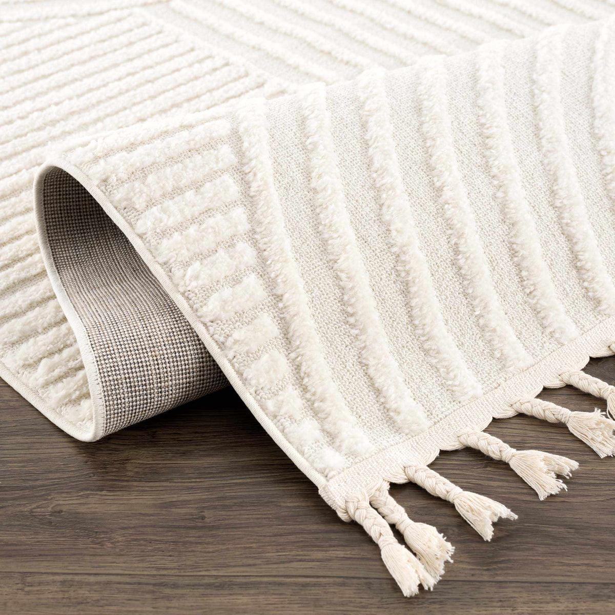 Guiling 3D Rainbow Area Rug with Tassels by Boutique Rugs, cream textured stripes on Tampa Home & Garden Store