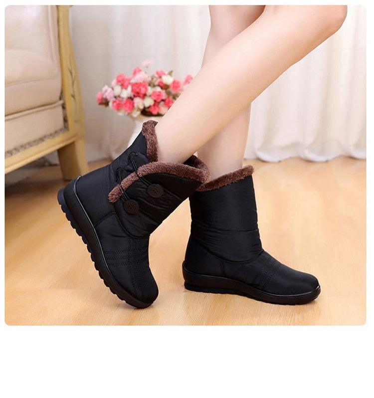 Stevvex black non-slip snow boots with brown faux fur lining, ankle height, thick sole on Tampa Home & Garden Store