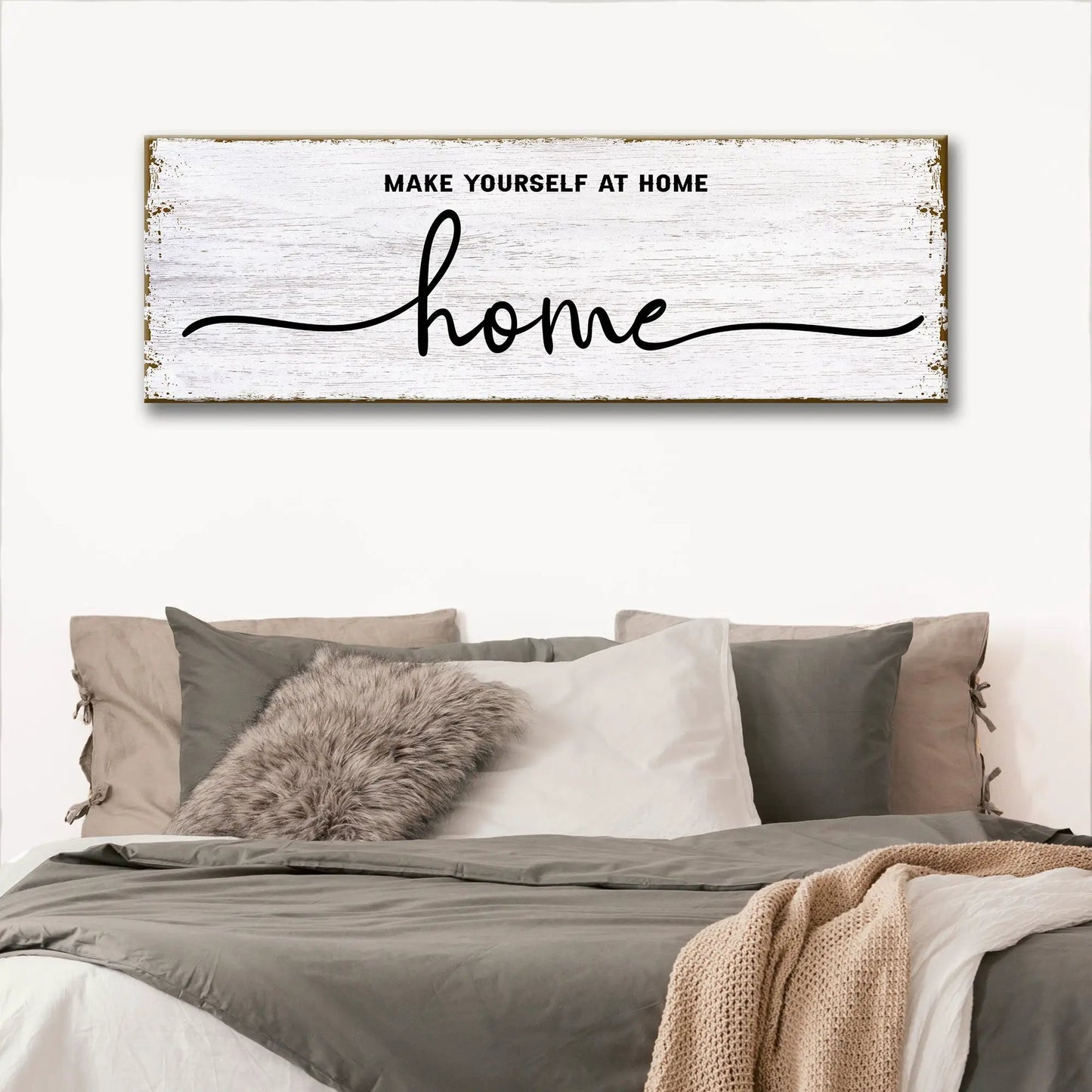 Make Yourself At Home Tailored Canvases sign, whitewashed plank backdrop, bold script home on Tampa Home & Garden Store