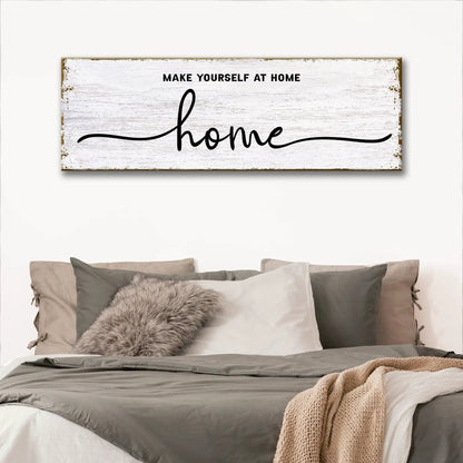 Make Yourself At Home Tailored Canvases sign, whitewashed plank backdrop, bold script home on Tampa Home & Garden Store
