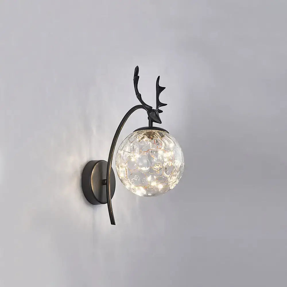 Black Antler Wall Sconce with glass orb shade, Decorbites wall light on Tampa Home & Garden Store