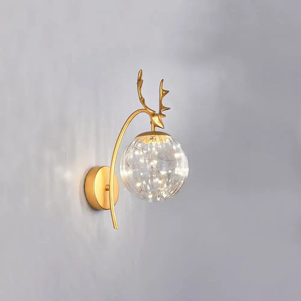 Black Antler Wall Sconce by Decorbites with gold finish, crackle-glass globe on Tampa Home & Garden Store