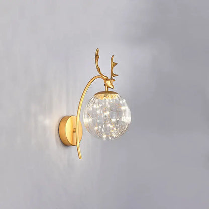 Black Antler Wall Sconce by Decorbites with gold finish, crackle-glass globe on Tampa Home & Garden Store