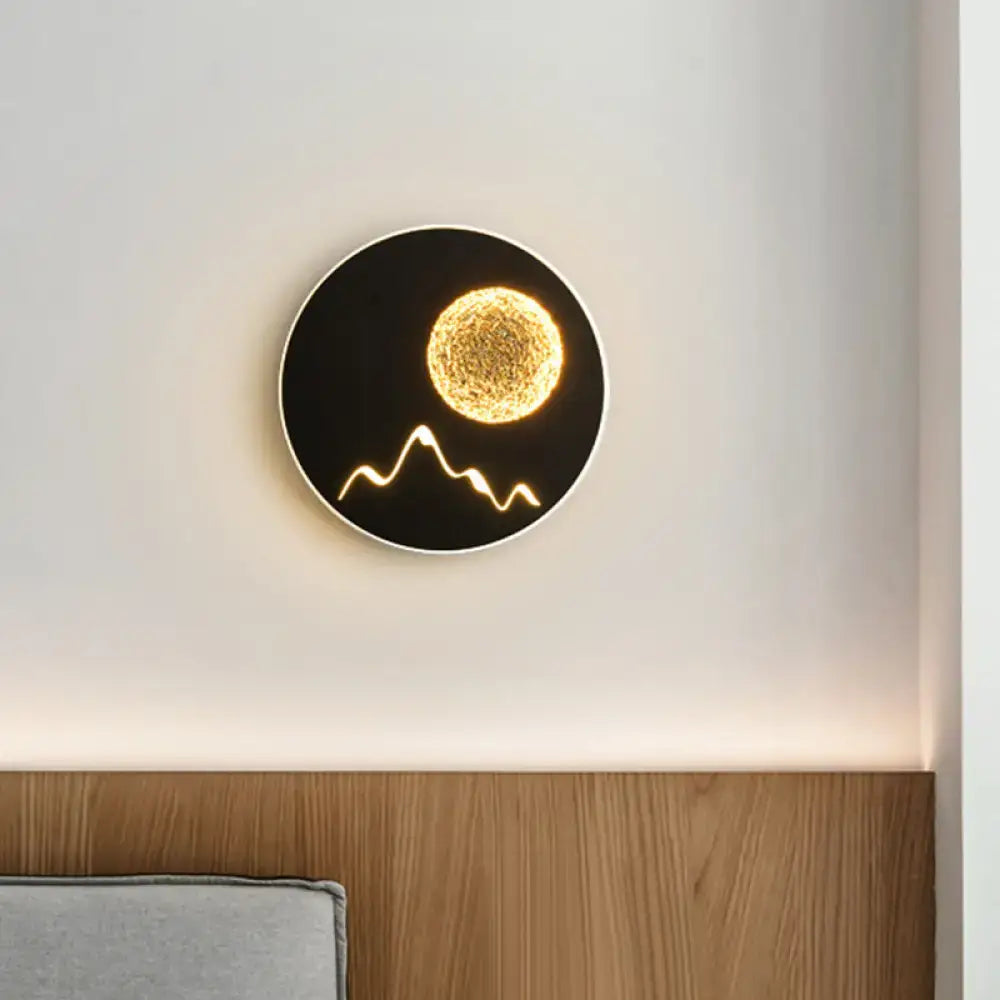 Metallic Mountain Wall Light by Decorbites, black sconce with gold sun and mountain silhouette on Tampa Home & Garden Store