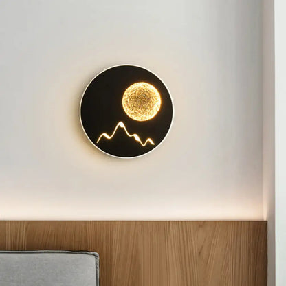Metallic Mountain Wall Light by Decorbites, black sconce with gold sun and mountain silhouette on Tampa Home & Garden Store