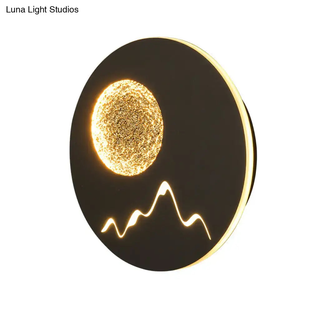 Decorbites Metallic Mountain Wall Light round black wall sconce with sun and mountain silhouette on Tampa Home & Garden Store