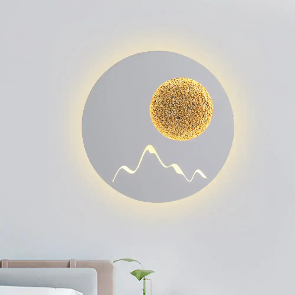 Decorbites Metallic Mountain Wall Light round wall sconce with textured gold moon and mountain on Tampa Home & Garden Store