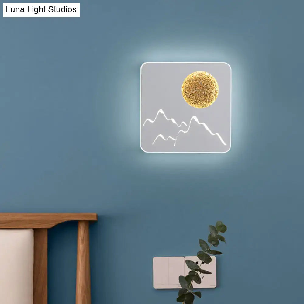 Metallic Mountain Wall Light with gold sun accent on a gray rounded-square panel on Tampa Home & Garden Store