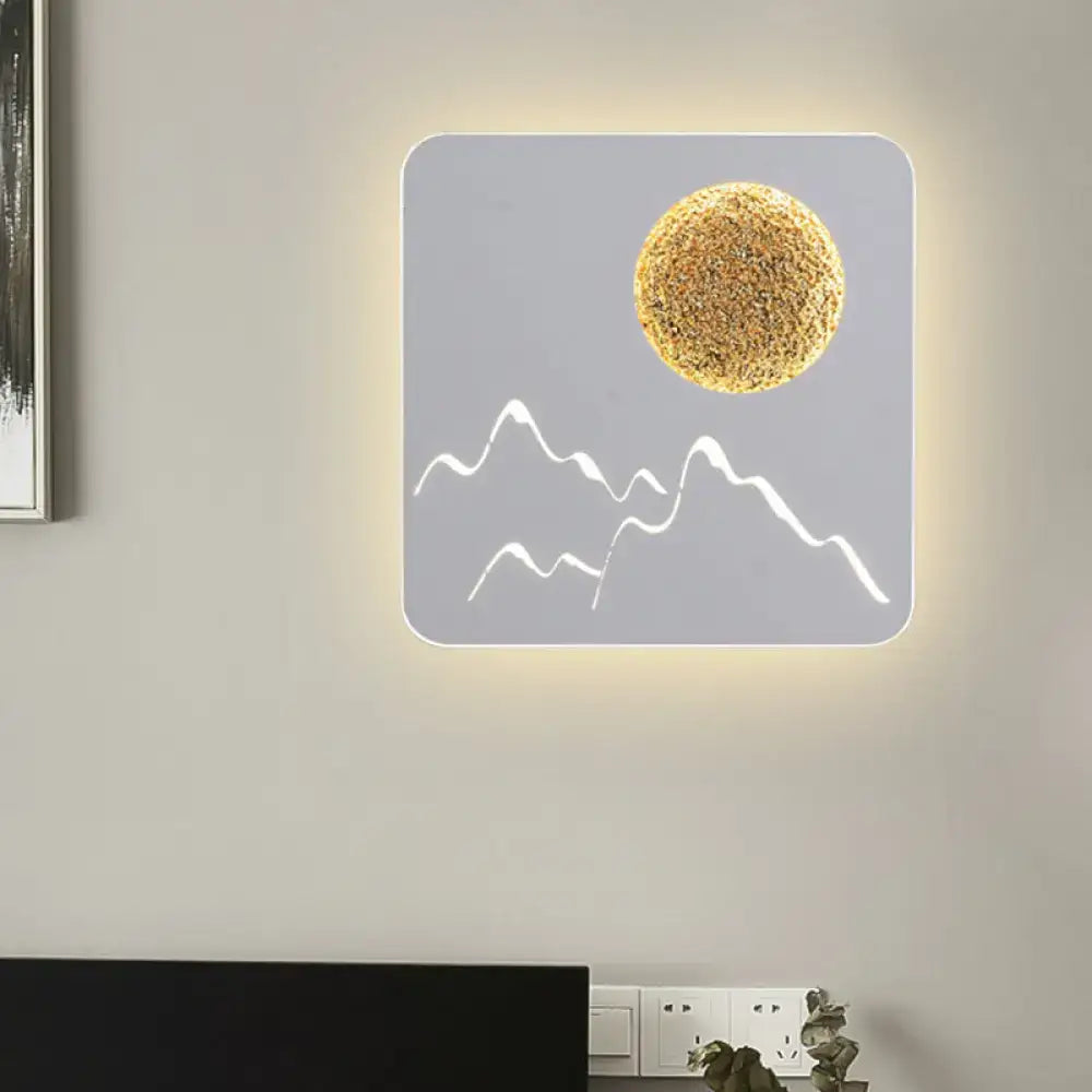 Metallic Mountain Wall Light by Decorbites; panel with white mountain lines and golden sun on Tampa Home & Garden Store