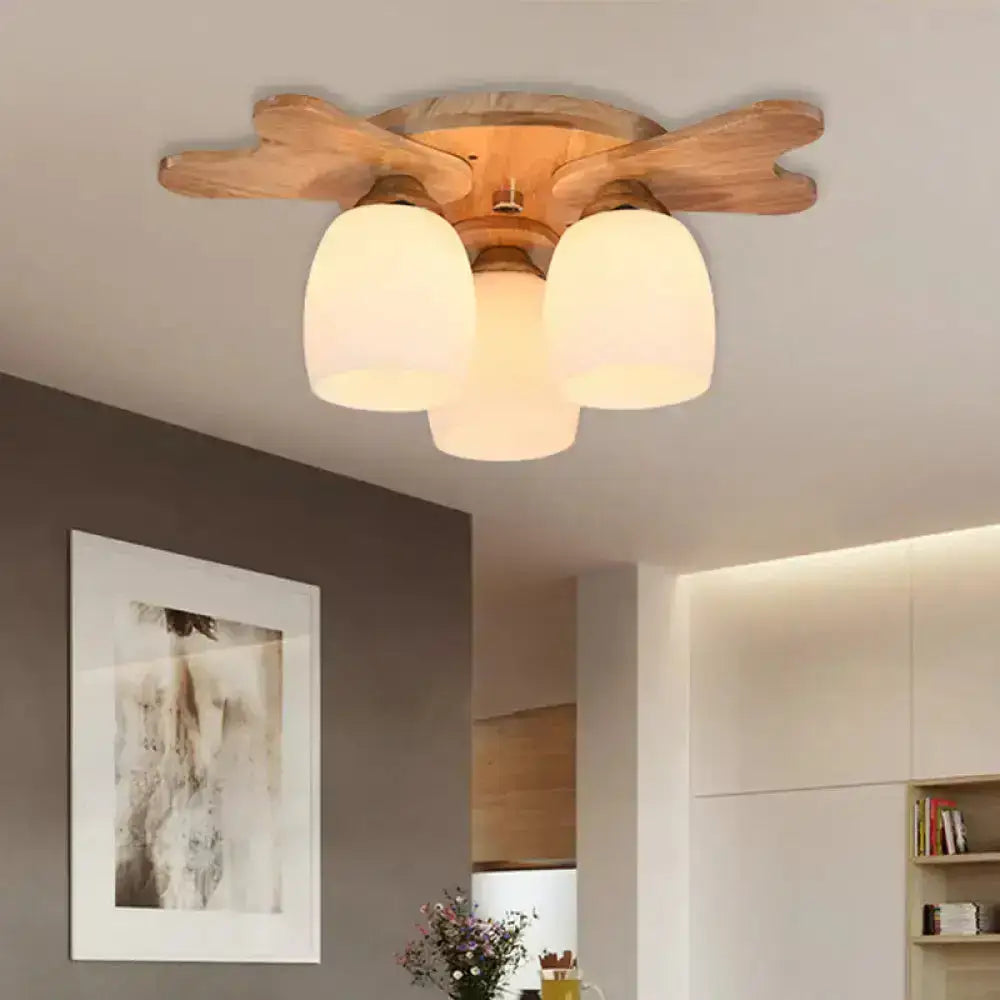 Decorbites Cream Glass Bell Ceiling Light with 3 cream glass shades on a wood flush mount on Tampa Home & Garden Store