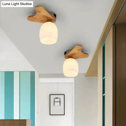 Two cream glass bell ceiling lights with wooden mounts by Decorbites flush mount for home on Tampa Home & Garden Store