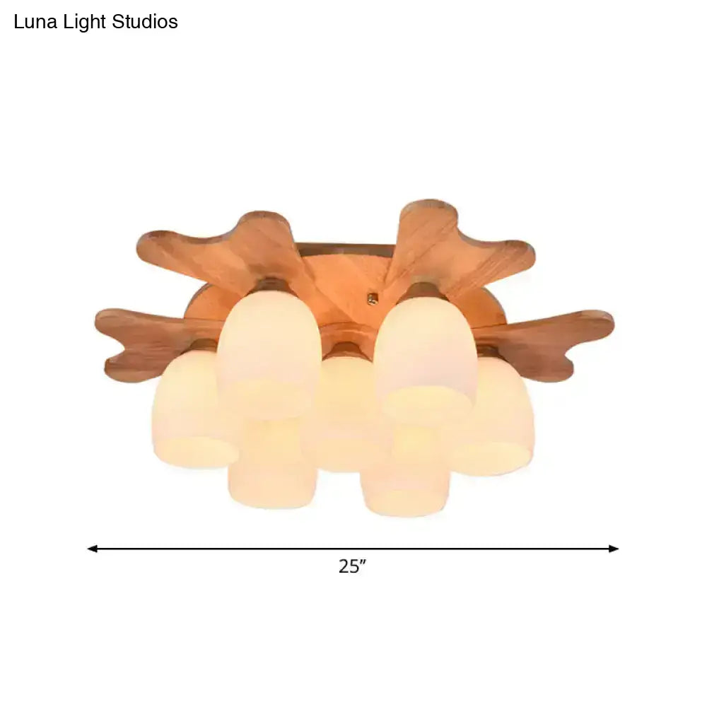 Cream glass bell ceiling light Decorbites frosted glass shades with wood leaf accents 25in wide on Tampa Home & Garden Store