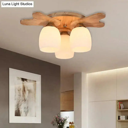 Cream glass bell ceiling light with three shades, wood canopy flush mount by Decorbites on Tampa Home & Garden Store