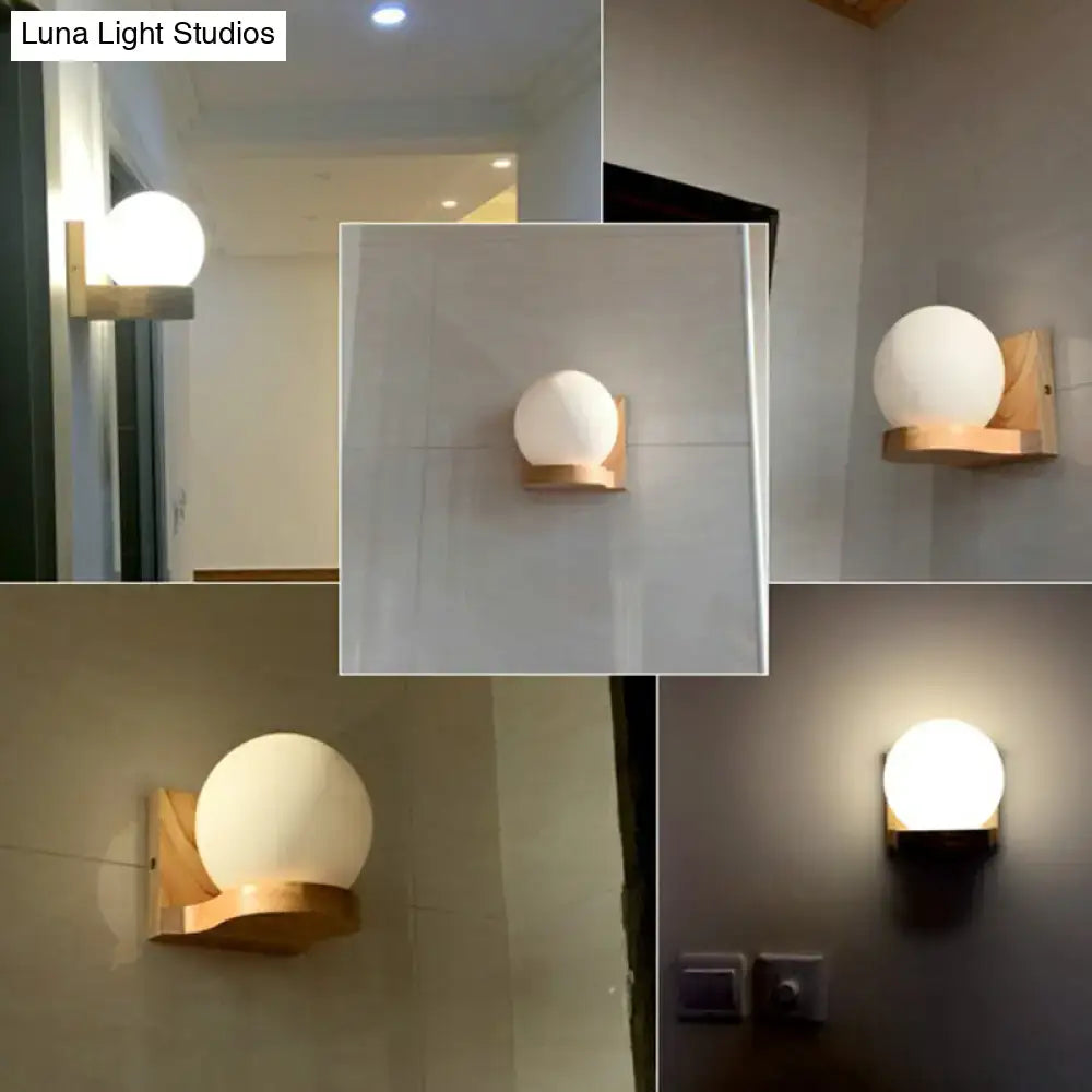 Decorbites Opal Glass Wood Sconce with round white glass globe and natural wood mount on Tampa Home & Garden Store