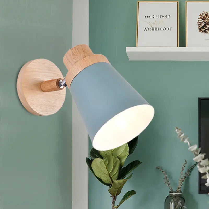 Gray wood coolie wall light by Decorbites with blue-gray shade and natural wood mount on Tampa Home & Garden Store
