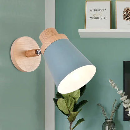 Gray wood coolie wall light by Decorbites with blue-gray shade and natural wood mount on Tampa Home & Garden Store