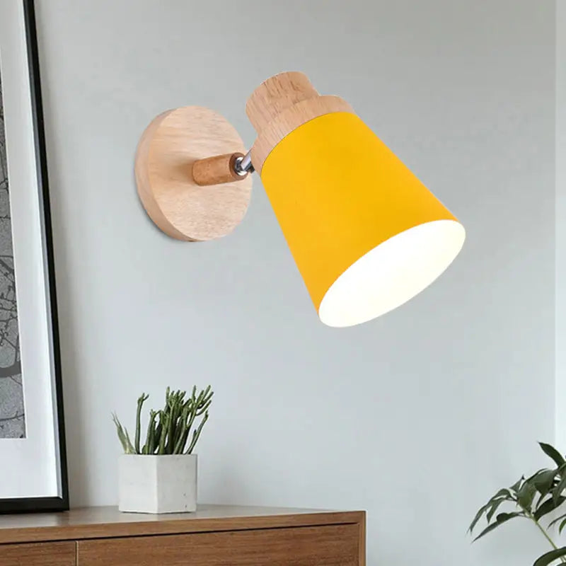 Gray Wood Coolie Wall Light sconce with yellow shade and natural wood mount on wall on Tampa Home & Garden Store