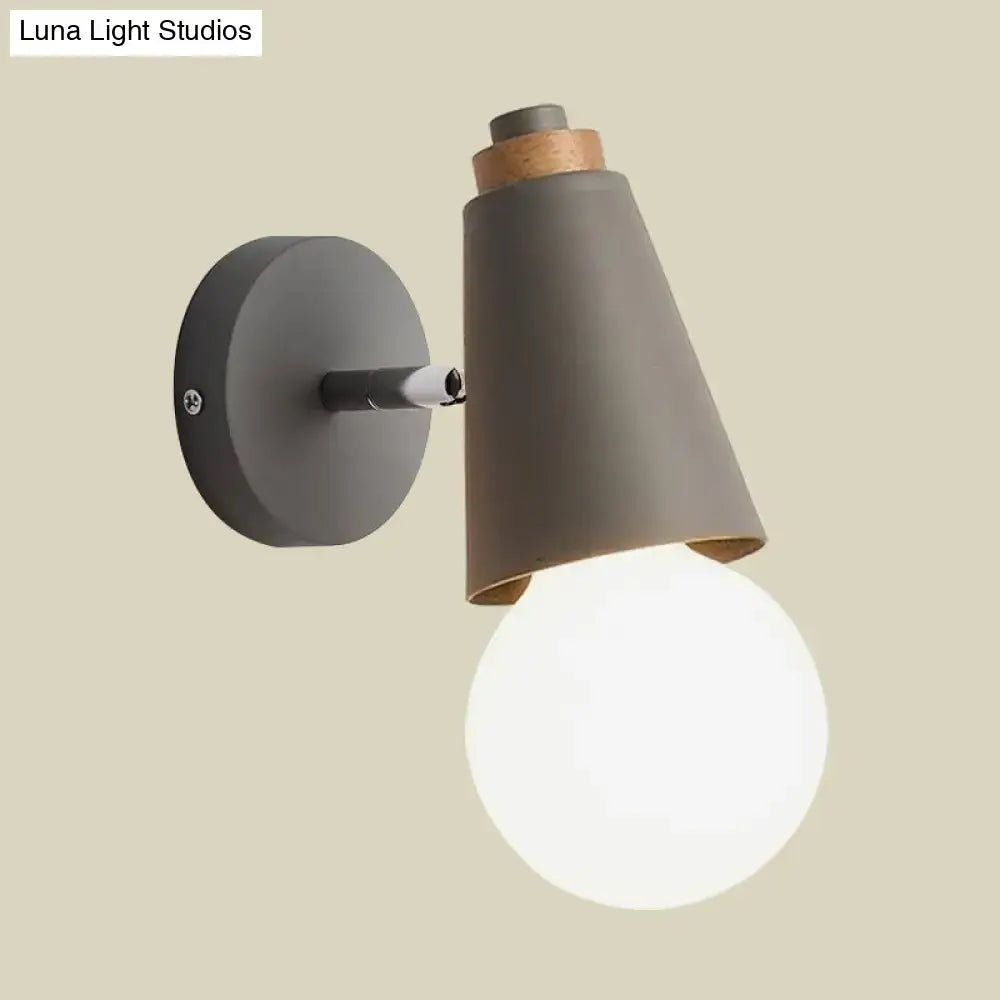 Bamboo Cone Wall Light by Decorbites; metal cone shade with wood accents and globe bulb on Tampa Home & Garden Store