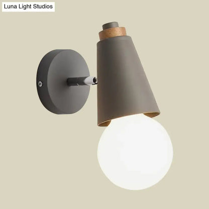 Bamboo Cone Wall Light by Decorbites; metal cone shade with wood accents and globe bulb on Tampa Home & Garden Store
