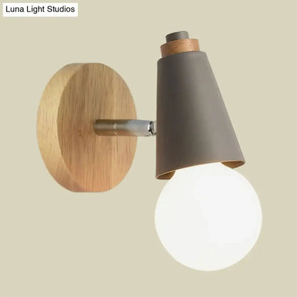 Bamboo cone wall light with round wood backplate and gray shade illuminated bulb on Tampa Home & Garden Store