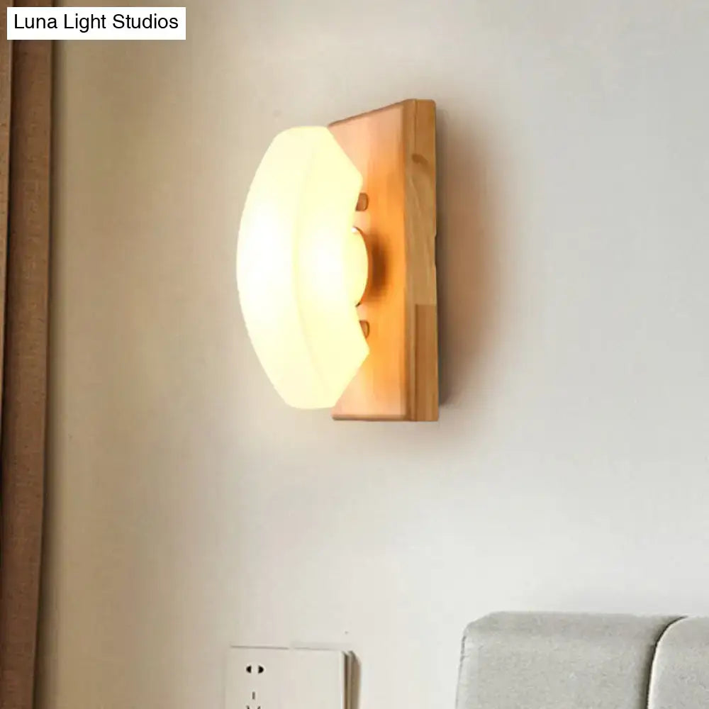 White frosted glass wood-back wall sconce by Decorbites on Tampa Home & Garden Store
