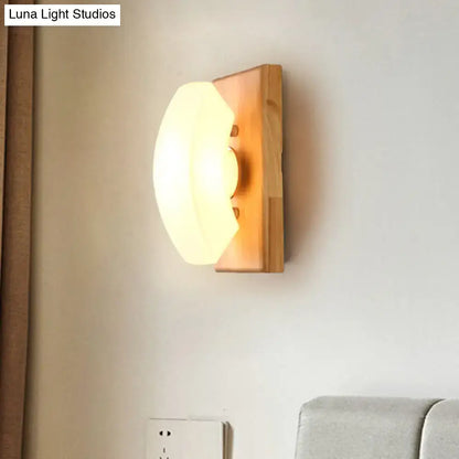 White frosted glass wood-back wall sconce by Decorbites on Tampa Home & Garden Store