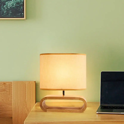 Wood Fabric Table Lamp by Decorbites with oval wooden base and beige fabric shade on Tampa Home & Garden Store