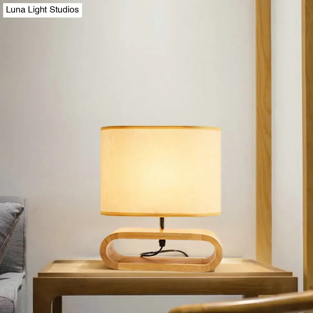 Wood Fabric Table Lamp by Decorbites with warm beige fabric shade and rounded wood base on Tampa Home & Garden Store