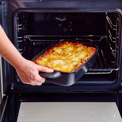 Enameled cast iron roasting pans, 12x8 in, Alva Cookware, 2 pans being removed from oven on Tampa Home & Garden Store