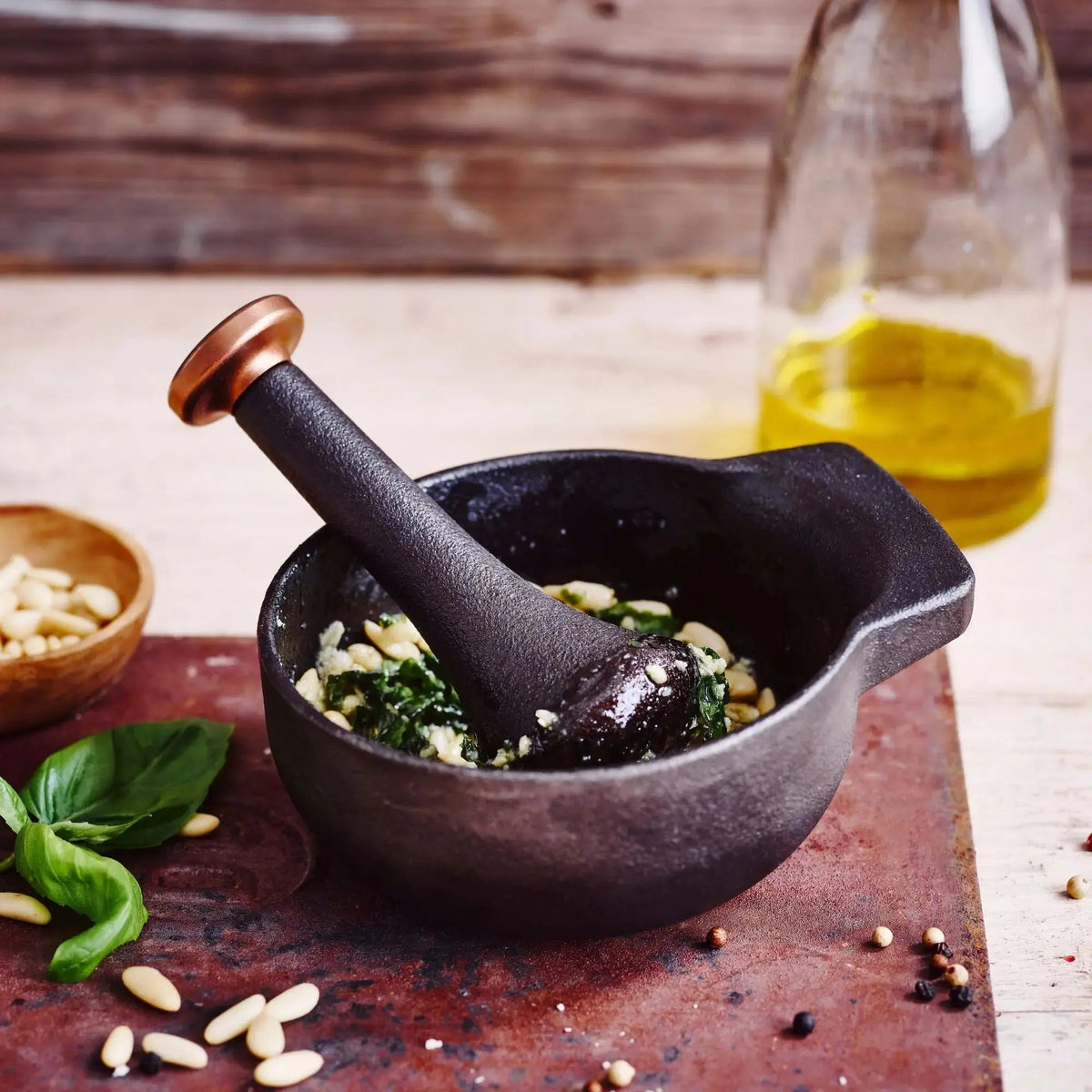Enameled cast iron mortar & pestle set, 2-cup, black with copper pestle by Alva Cookware on Tampa Home & Garden Store
