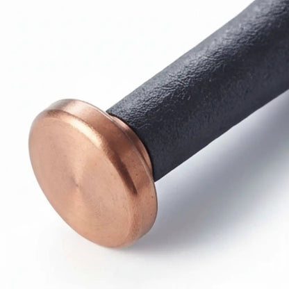 Enameled cast iron pestle with copper end and black textured handle on Tampa Home & Garden Store