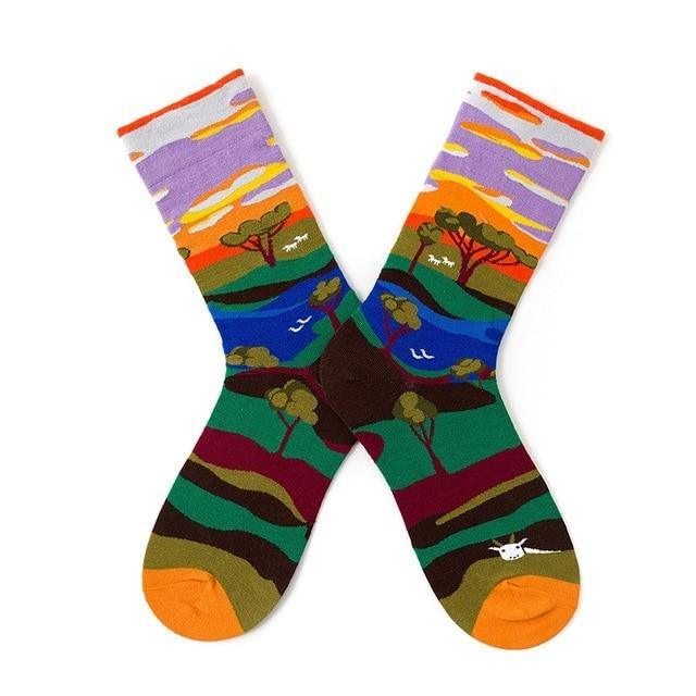 Pair of novelty women's crew socks with abstract landscape design in orange and purple on Tampa Home & Garden Store