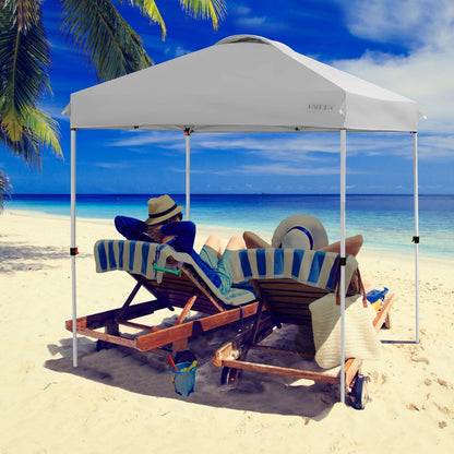 GemGear 6.6x6.6ft white outdoor pop-up canopy on sunny beach on Tampa Home & Garden Store
